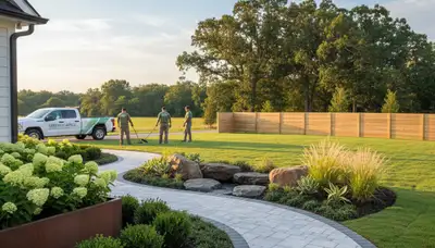 Landscaping crew servicing a Greenville, NC property for lawn care and landscape maintenance